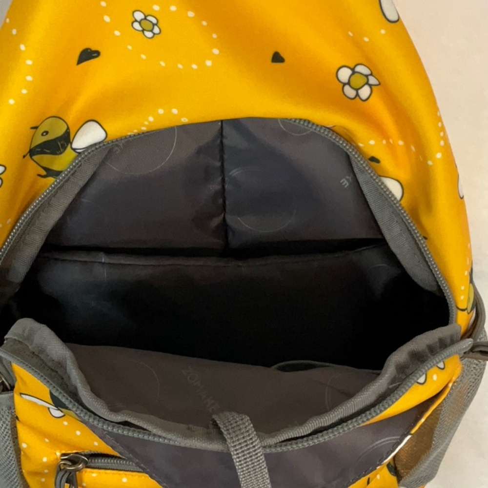 NWOT Yellow Bee Print Sling Backpack - Picture 7 of 7
